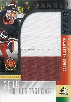 2020-21 SP Game Used - 2019 NHL Heritage Classic Banner Year Relics #HC20-CH Connor Hellebuyck Front