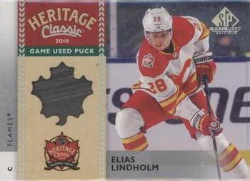 2020-21 SP Game Used - 2019 NHL Heritage Classic Game Used Pucks #HCP-EL Elias Lindholm Front
