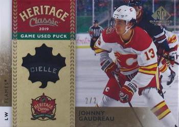 2020-21 SP Game Used - 2019 NHL Heritage Classic Game Used Pucks Gold #HCP-JG Johnny Gaudreau Front