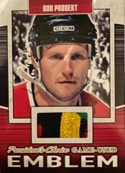 2018-19 President's Choice Game-Used - Emblem #GUE-67 Bob Probert Front