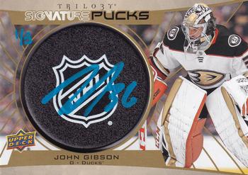 2020-21 Upper Deck Trilogy - Signature Pucks NHL Shield Logo #SP-JG John Gibson Front