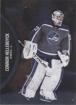 2021-22 SkyBox Metal Universe #104 Connor Hellebuyck Front