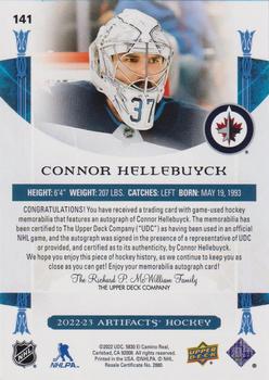 2022-23 Upper Deck Artifacts - Horizontal Auto Material Gold #141 Connor Hellebuyck Back