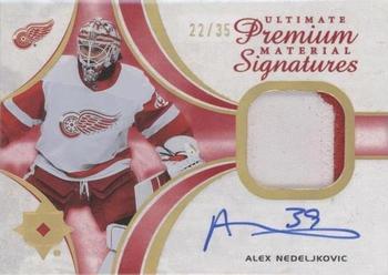 2021-22 Upper Deck Ultimate Collection - Ultimate Premium Material Signatures #UMS-AN Alex Nedeljkovic Front