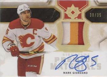 2021-22 Upper Deck Ultimate Collection - 2020-21 Upper Deck Ultimate Collection Update: Ultimate Signature Premium Materials #SPM-MG Mark Giordano Front