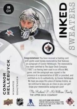 2023-24 SP Game Used - Inked Sweaters #IS-CH Connor Hellebuyck Back