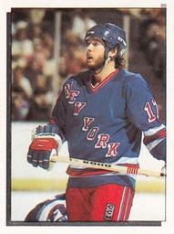 1984-85 O-Pee-Chee Stickers #99 Mike Rogers Front