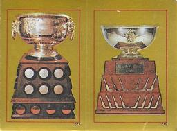 1984-85 O-Pee-Chee Stickers #219 / 221 Jennings Trophy / Art Ross Trophy Front