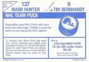 1985-86 O-Pee-Chee Stickers #9 / 137 Tim Bernhardt / Mark Hunter Back