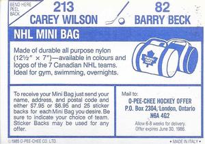 1985-86 O-Pee-Chee Stickers #82 / 213 Barry Beck / Carey Wilson Back