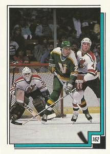 1988-89 O-Pee-Chee Stickers #162 1987-88 Action Front