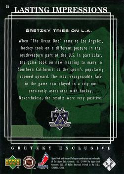 1999-00 Upper Deck - Gretzky Exclusive #92 Gretzky Tries on L.A. Back