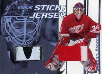 2001-02 Be a Player Between the Pipes - Jersey and Stick Cards #GSJ-25 Manny Legace Front