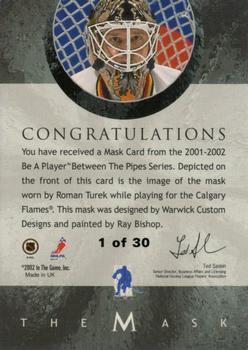 2001-02 Be a Player Between the Pipes - The Mask Gold #NNO Roman Turek Back