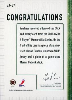 2003-04 Be a Player Memorabilia - Jersey and Stick #SJ-37 Marian Gaborik Back