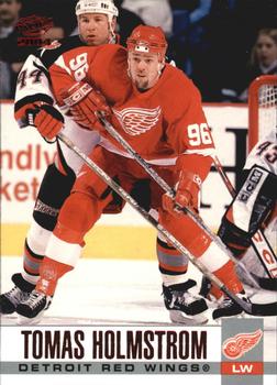 2003-04 Pacific - Red #118 Tomas Holmstrom Front