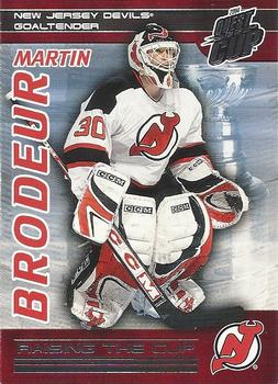 2003-04 Pacific Quest for the Cup - Raising the Cup #12 Martin Brodeur Front