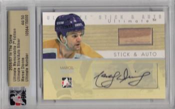 2006-07 In The Game Ultimate Memorabilia - Sticks Autos #1 Marcel Dionne  Front