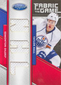 2011-12 Panini Certified - Fabric of the Game NHL Die Cut #60 Taylor Hall Front