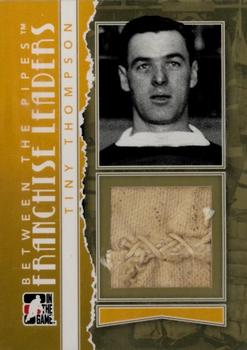 2010-11 In The Game Between The Pipes - Franchise Leaders Jerseys Gold #FL-03 Tiny Thompson Front