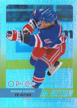 2010-11 O-Pee-Chee - In Action #IA-37 Marian Gaborik Front