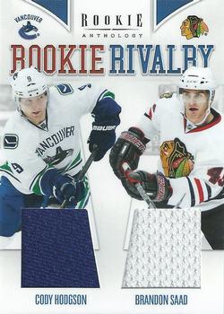 2011-12 Panini Rookie Anthology - Rookie Rivalry Dual Jerseys #11 Cody Hodgson / Brandon Saad Front