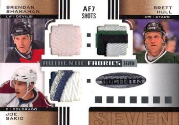 2011-12 SP Game Used - Authentic Fabrics Sevens Patches #AF7 SHOTS Ray Bourque / Marcel Dionne / Al MacInnis / Wayne Gretzky / Brendan Shanahan / Brett Hull / Joe Sakic Back