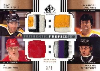 2011-12 SP Game Used - Authentic Fabrics Sevens Patches #AF7 SHOTS Ray Bourque / Marcel Dionne / Al MacInnis / Wayne Gretzky / Brendan Shanahan / Brett Hull / Joe Sakic Front