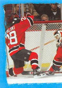 2003-04 Panini Stickers #80 Devils Game Moment Front