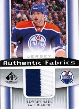 2013-14 SP Game Used - Authentic Fabrics #AF-TH Taylor Hall Front