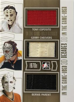 2013-14 In The Game Used - Decades Triple Jerseys Gold #D-22 Tony Esposito / Gerry Cheevers / Bernie Parent Front