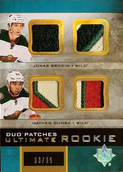 2013-14 Upper Deck Ultimate Collection - Ultimate Rookie Duos Patches #URJ2-WILD Jonas Brodin / Mathew Dumba Front
