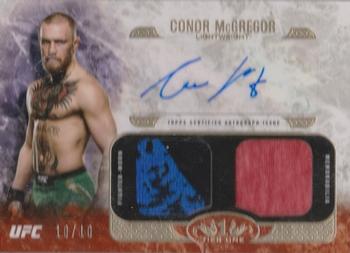 2017 Topps UFC Knockout - Tier One Autographed Dual Relics #ADR-CM Conor McGregor Front
