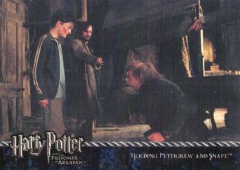 2004 Cards Inc. Harry Potter and the Prisoner of Azkaban #60 Holding Pettigrew and Snape Front