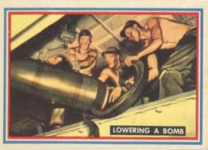 1953 Topps Fighting Marines (R709-1) #48 Lowering a Bomb Front