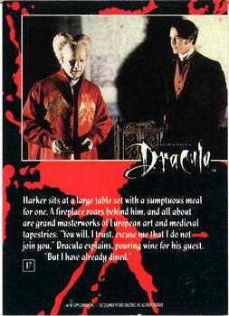 1992 Topps Bram Stoker's Dracula #17 Harker sits at a large table set with a Back
