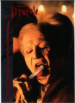 1992 Topps Bram Stoker's Dracula #20 While shaving in his room, Harker is in Front