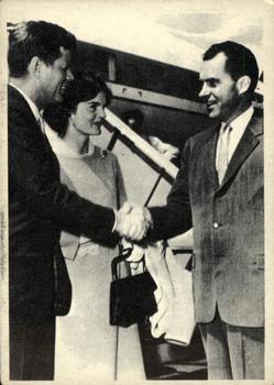 1964 Topps John F. Kennedy #8 Congressman Kennedy and his wife Jacqueline greet VP Richard Nixon Front