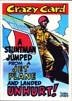 1961 Topps Crazy Cards #4 A stuntman jumped from a jet plane and landed unhurt! Front