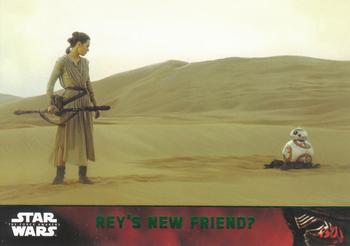 2015 Topps Star Wars: The Force Awakens - Lightsaber Green #79 Rey's new friend? Front