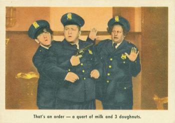 1959 Fleer The Three Stooges #53 That's an order - a quart of milk and 3 doughnuts. Front