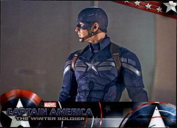 2014 Upper Deck Captain America The Winter Soldier #9 In preparation for a mission, Steve Rogers dons hi Front
