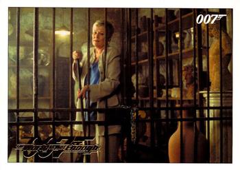 2016 Rittenhouse James Bond 007 Classics - Gold #50 Back in her cell, M realizes Front