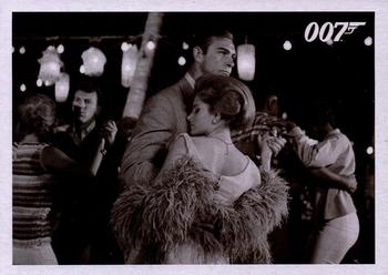 2014 Rittenhouse James Bond Archives - Thunderball Throwback #071 In the Kiss Kiss Club, 007 pulls a young woman to Front