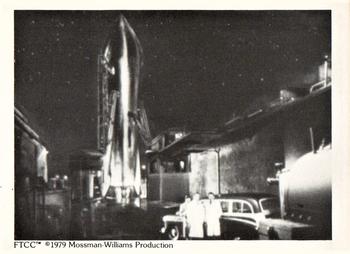 1979 FTCC Rocketship X-M #14 At the launch site, technicians prepare the Front