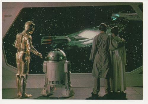 1980 Topps The Empire Strikes Back Photo Cards #21 C-3PO / R2-D2 / Luke Skywalker / Princess Leia Front