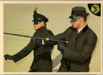 1966 Donruss The Green Hornet #40 Seeing the stolen car driving away, Kato unleashes Front
