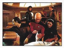 1987 Panini Star Trek: The Next Generation Stickers #12 Crew assisting frozen crewmember Front
