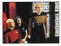 1987 Panini Star Trek: The Next Generation Stickers #26 Picard, Troi and Yar, protesting unfairness of trial Front