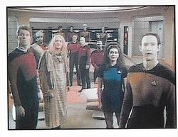 1987 Panini Star Trek: The Next Generation Stickers #54 Bridge crew, Zorn and Q (Starfleet uniform) facing viewscreen Front